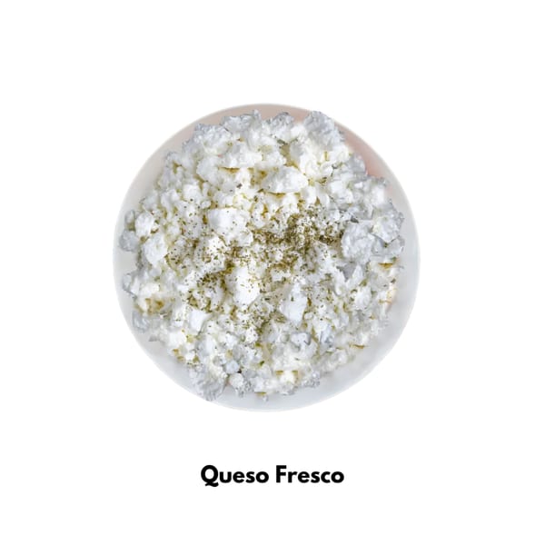 A white bowl filled with crumbled Queso Fresco cheese, sprinkled with green herbs.