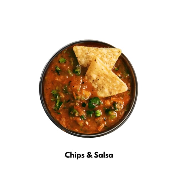 A black bowl of Tacos El Primo's chunky red salsa with two tortilla chips dipped in it.