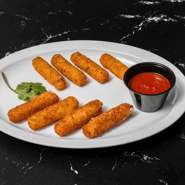 Eight golden-brown mozzarella sticks with a side of red dipping sauce and a cilantro garnish.
