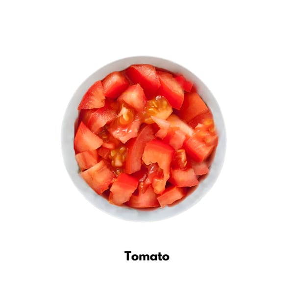 A white bowl filled with freshly diced red tomatoes, ready for Mexican dishes.